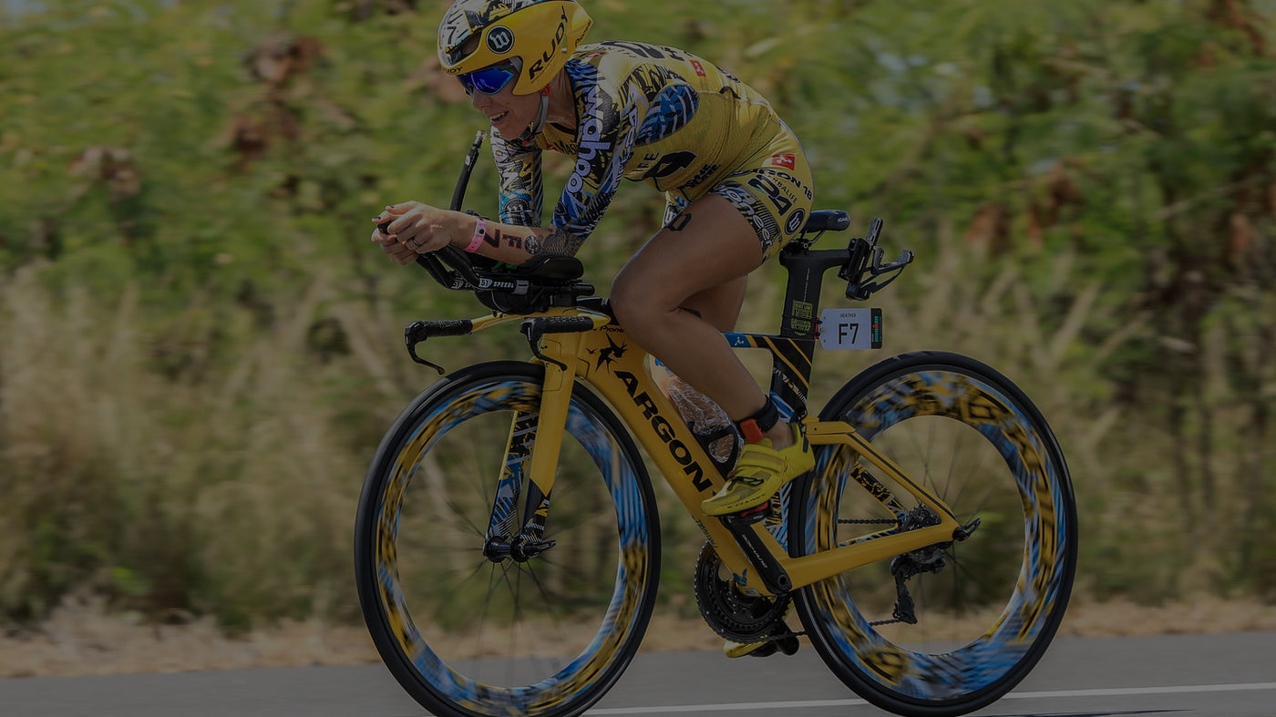 Heather Jackson riding her yellow Argon 18